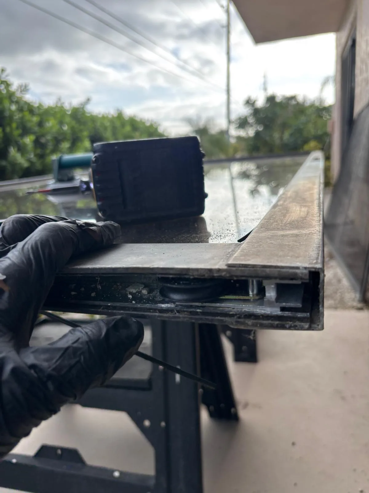 Replacement rollers installed on an impact sliding door in Vero Beach