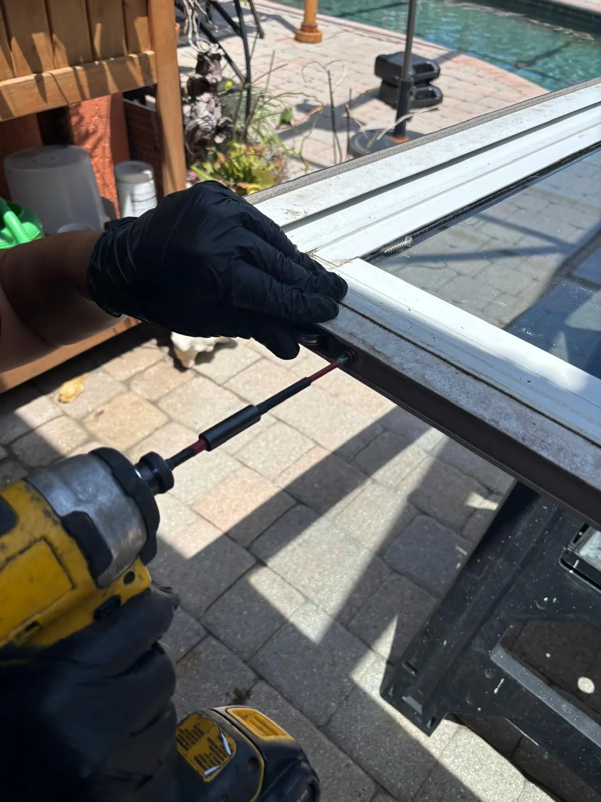 Screen door roller removal during repair