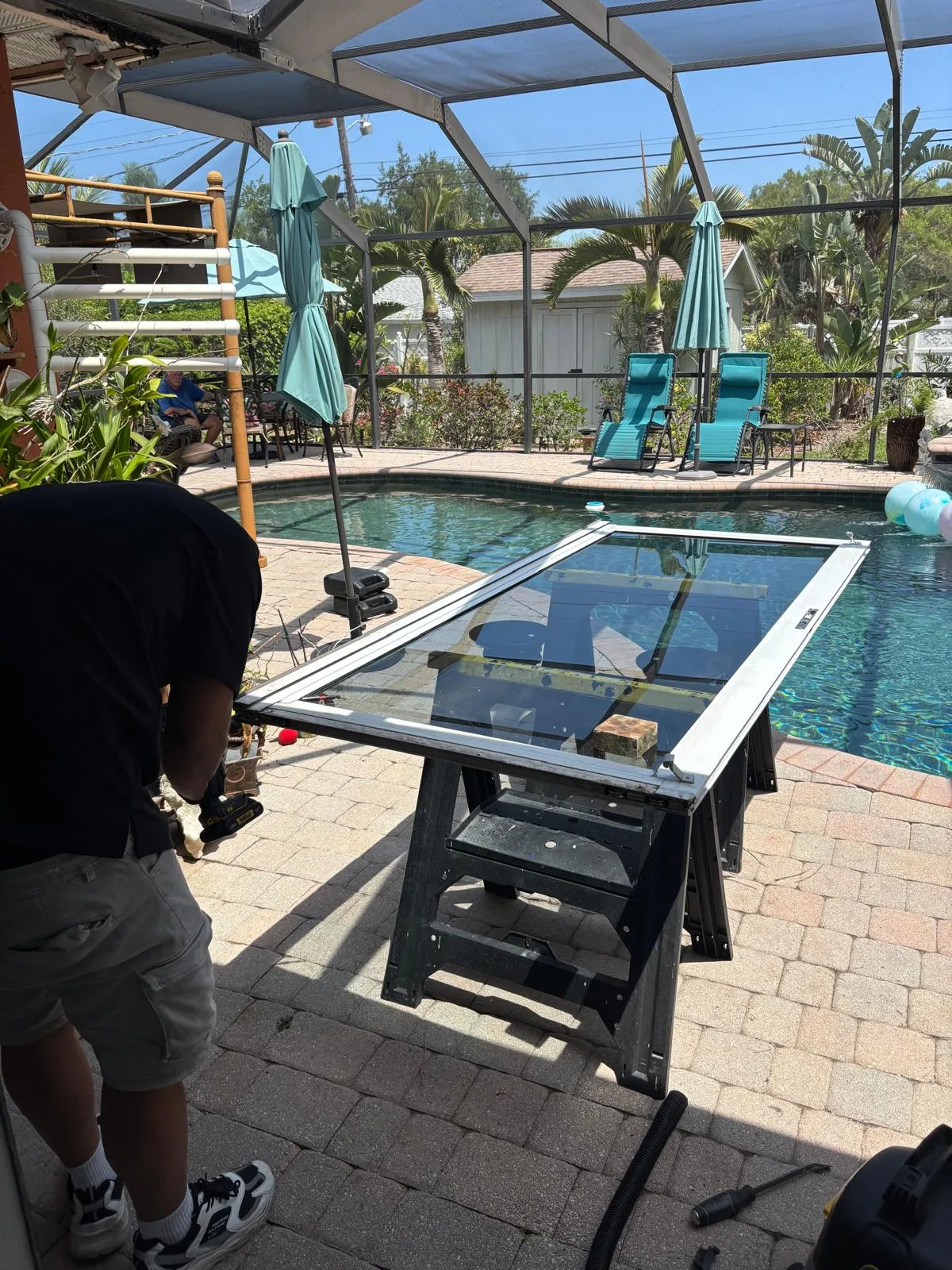 Sliding door weatherstripping inspection at base of door